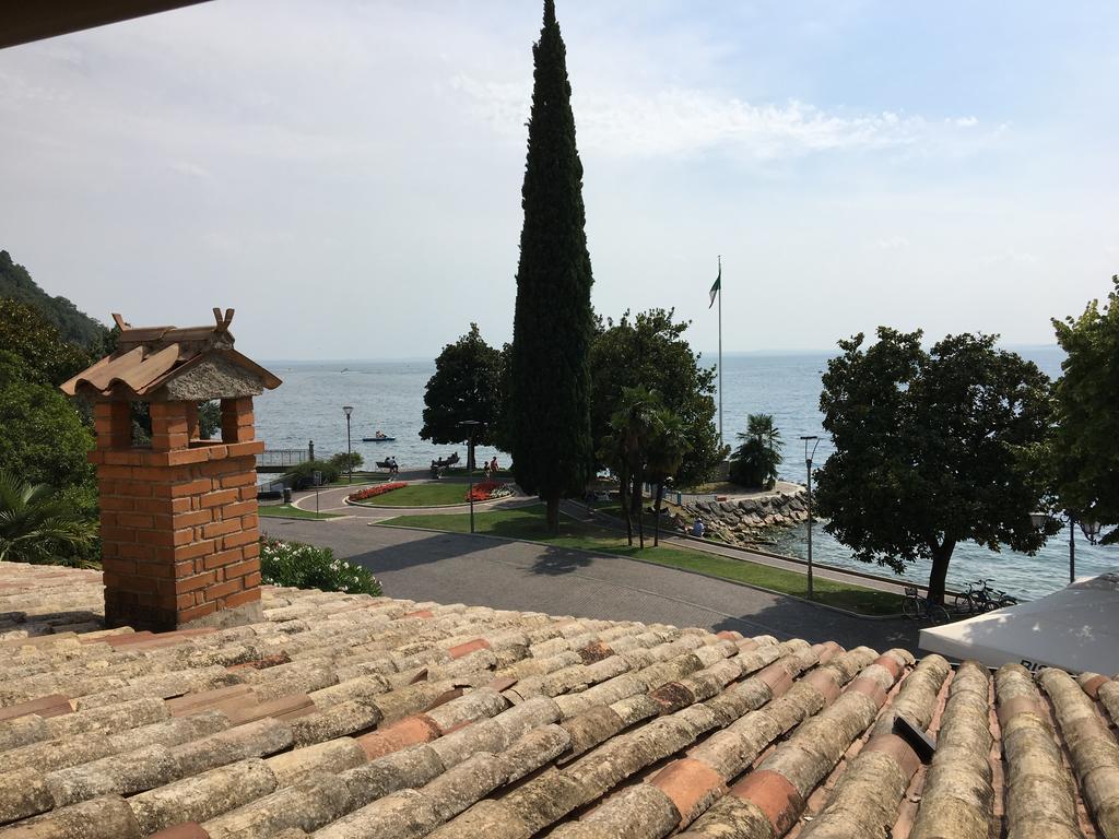 Welcome Traveller Merlo Nero Apartments Garda  Bagian luar foto